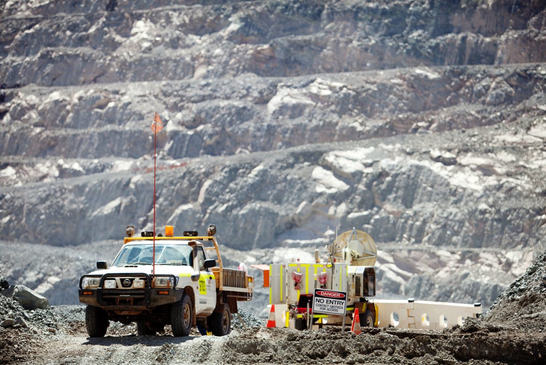 preparing for a blast at open cut mine